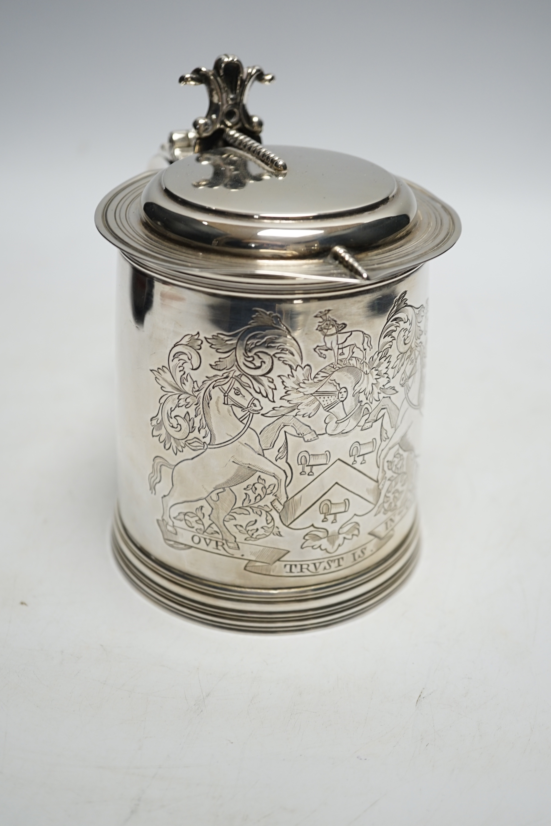 A late Victorian silver tankard, with engraved crest and the motto 'Our Trust is in God', William & John Barnard, London, 1894, 14.4cm, 17oz.